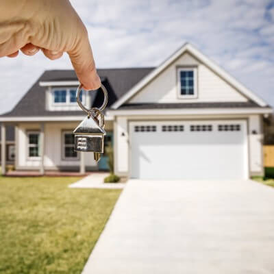 Keys in front of home